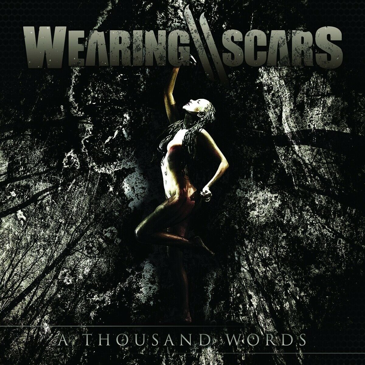 Wearing Scars - A Thousand Words ryhmässä CD @ Bengans Skivbutik AB (1387214)